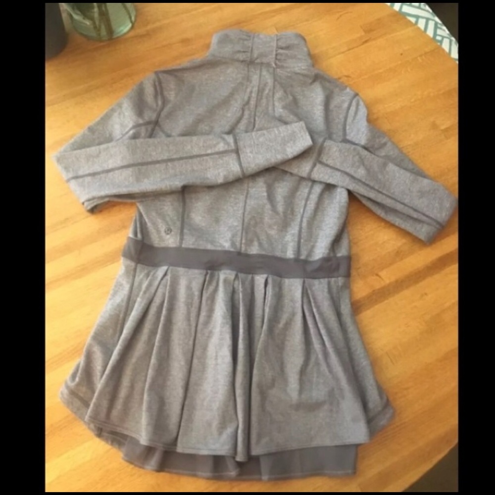 Lululemon riding peplum back jacket.